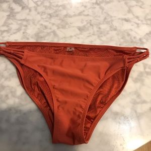 Volcom orange/rust bikini bottoms with side twist